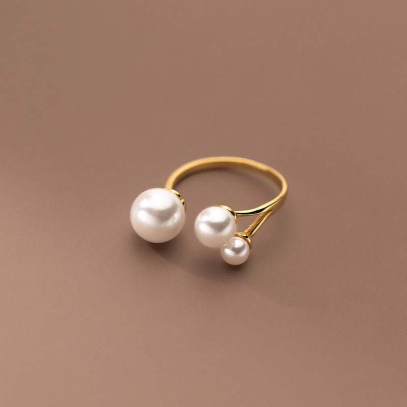 Bague ajustable en perles d'eau douce triples